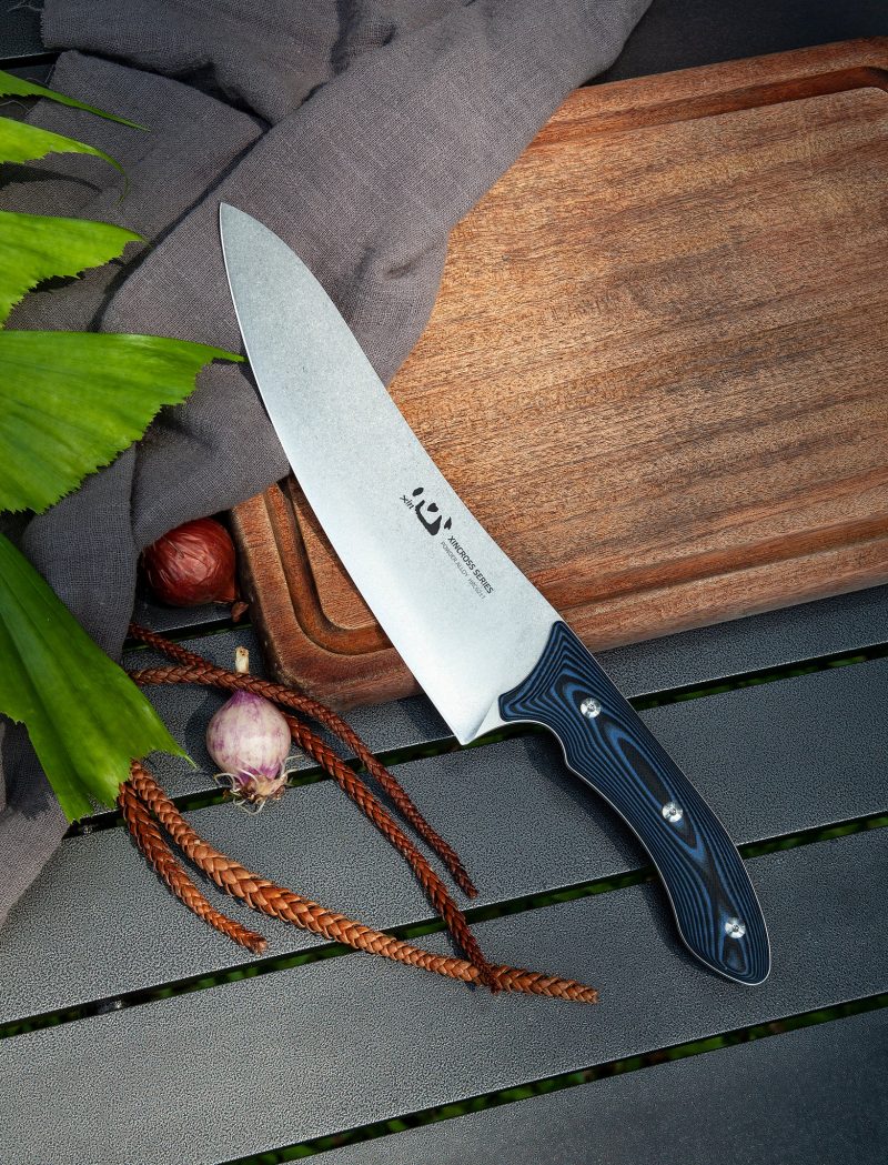 XC113 XinCross 8.3 Tactical Style Chef Knife (Stone Wash) on chopping board