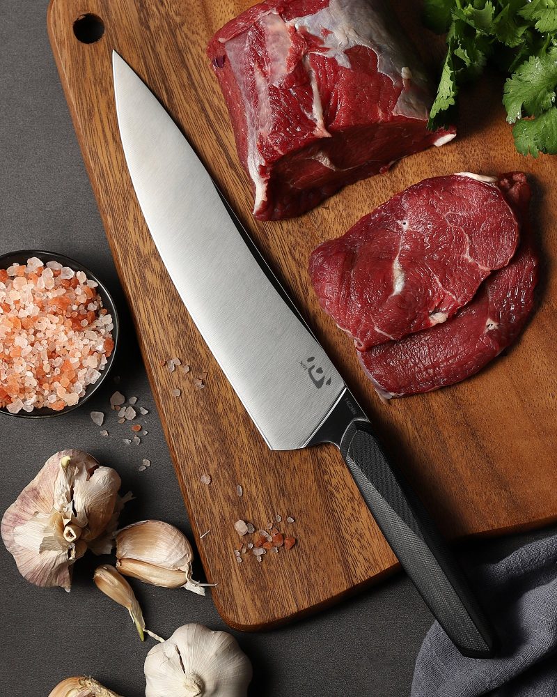 XC124 XinCore 8.514C28N Chef Knife on Cutting Board