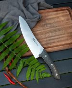XC115 XinCross 8.3 Tactical Style Chef Knife (Stone Wash) on chopping board