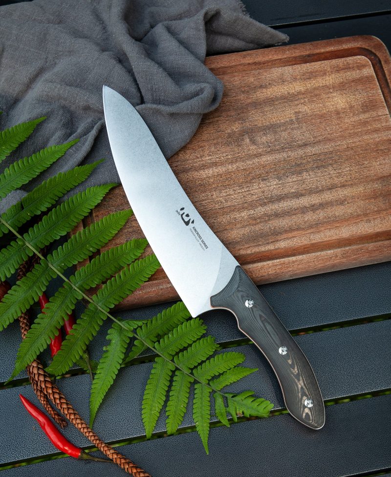 XC115 XinCross 8.3 Tactical Style Chef Knife (Stone Wash) on chopping board